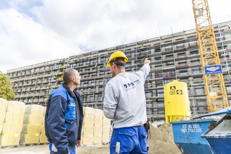 Mitarbeitende der R+S Group auf einer Baustelle